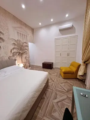 Letto o letti in una camera di Relais Santa Lucia sul Mare, Napoli