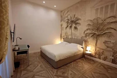 Letto o letti in una camera di Relais Santa Lucia sul Mare, Napoli