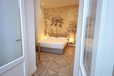 Letto o letti in una camera di Relais Santa Lucia sul Mare, Napoli