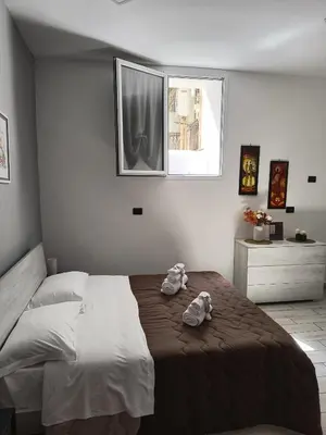 Letto o letti in una camera di La Dimora del Sarto