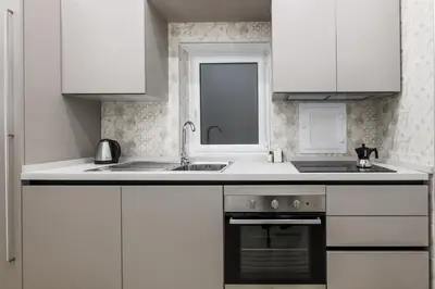 Cucina o angolo cottura di Tofa Apartments By Dimorra