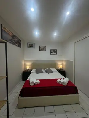 Letto o letti in una camera di Chez Moi Napoli