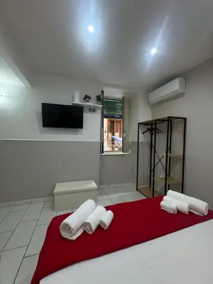 Letto o letti in una camera di Chez Moi Napoli