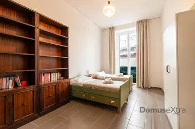 Letto o letti in una camera di Casa Leonardo al Gesu By DomusExtra