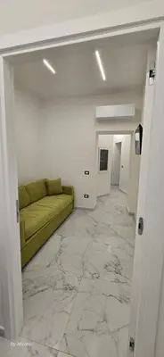 Area soggiorno di Appartamenti La Dimora di Parthenope a Pontenuovo