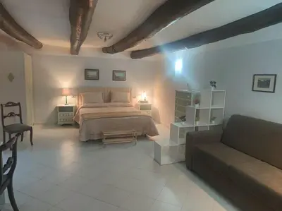 Letto o letti in una camera di Casa di Tonia