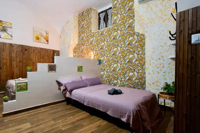Letto o letti in una camera di Metro 300m & SpaccaNapoli 5min - Authentic Loft