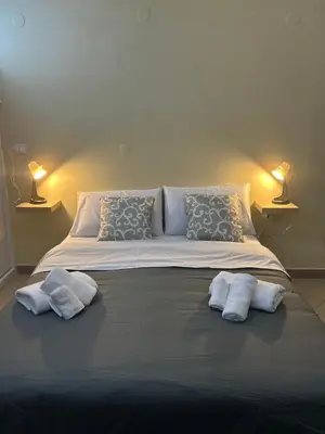Letto o letti in una camera di Casa Vacanza Francesca