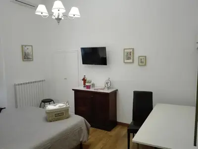Letto o letti in una camera di Napoli Pietrasanta LT