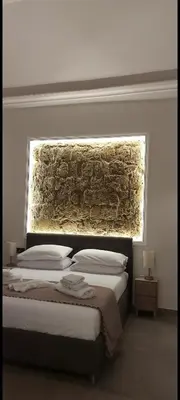 Letto o letti in una camera di Pignasecca Domus