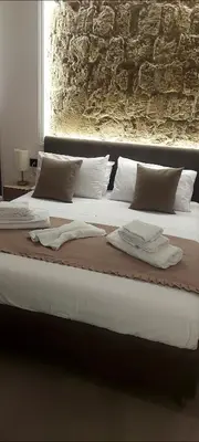 Letto o letti in una camera di Pignasecca Domus