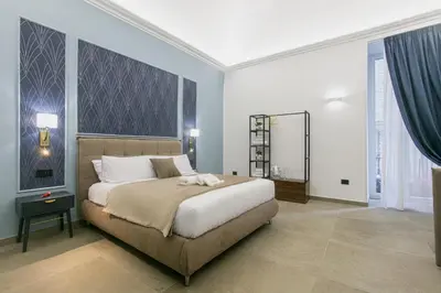 Letto o letti in una camera di Pignasecca Domus