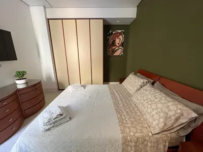 Letto o letti in una camera di Casa Leaf