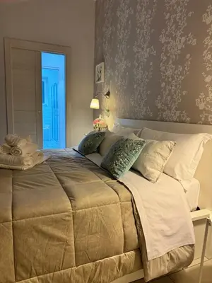 Letto o letti in una camera di Debby's Home