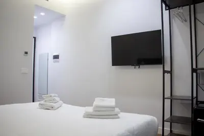 Letto o letti in una camera di Central Promenade