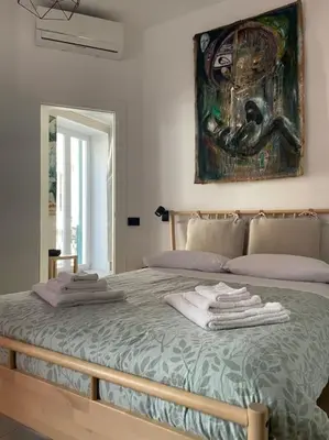 Letto o letti in una camera di Galleria Berio