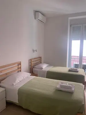 Letto o letti in una camera di Galleria Berio
