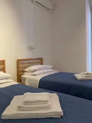 Letto o letti in una camera di Galleria Berio