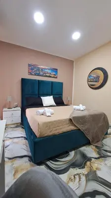Letto o letti in una camera di Nel Cuore Di Napoli