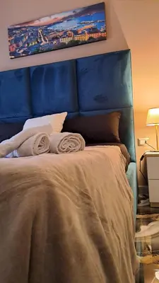 Letto o letti in una camera di Nel Cuore Di Napoli