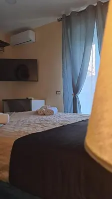 Letto o letti in una camera di Nel Cuore Di Napoli