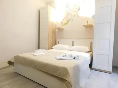 Letto o letti in una camera di Appartamento Isabel a Cavour