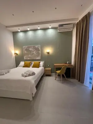 Letto o letti in una camera di B&B Core Analfabeta