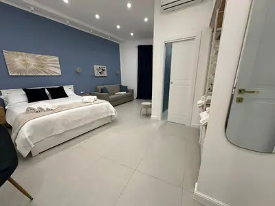 Letto o letti in una camera di B&B Core Analfabeta