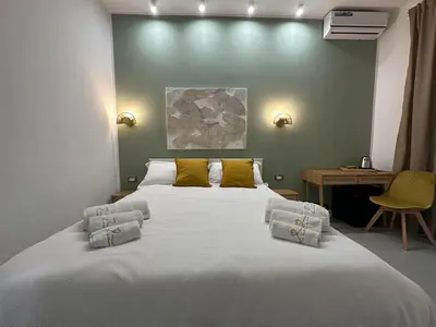 Letto o letti in una camera di B&B Core Analfabeta