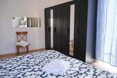 Letto o letti in una camera di Le Terrazze di Napoli