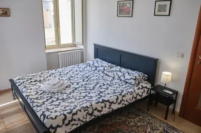 Letto o letti in una camera di Le Terrazze di Napoli
