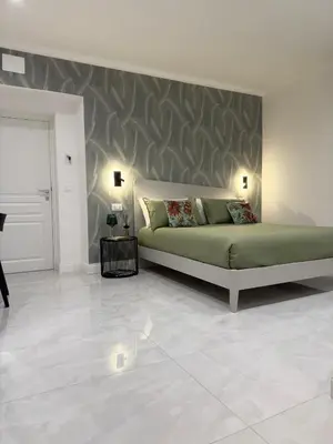 Letto o letti in una camera di Carafa Rooms
