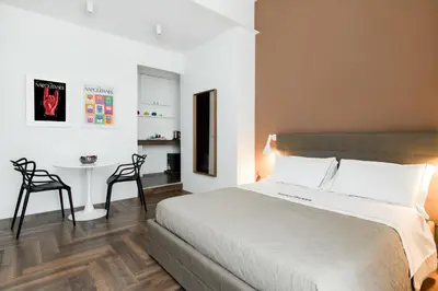 Letto o letti in una camera di The Napolitaner - Duomo Suite