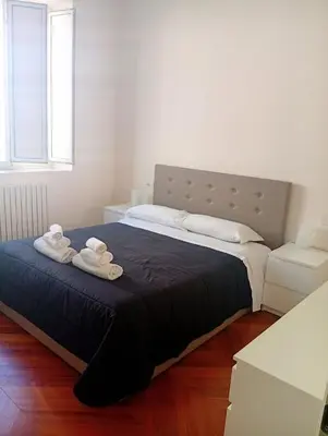 Letto o letti in una camera di La casa di Megaride