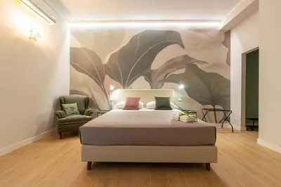 Letto o letti in una camera di La Casa di MaVì - elegante e spazioso appartamento