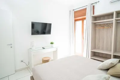 Letto o letti in una camera di Penthouse