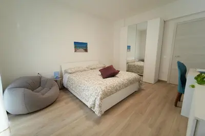 Letto o letti in una camera di Panorama Vesuvius Affittacamere Guesthouse with Lift near to Subway in Napoli Center