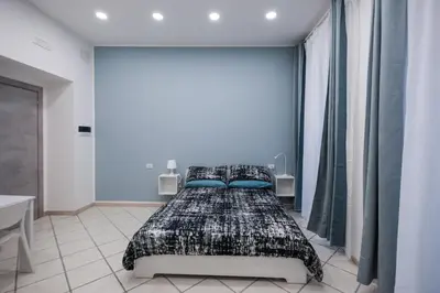 Letto o letti in una camera di Casa De Deo