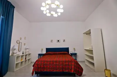 Letto o letti in una camera di Dante & Serenella station