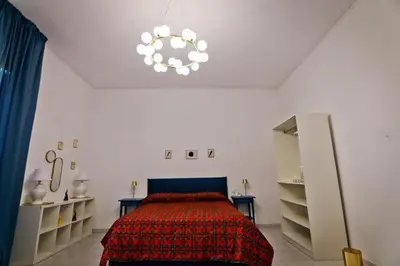 Letto o letti in una camera di Dante & Serenella station