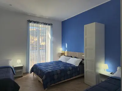 Letto o letti in una camera di Appartamento Annunziata
