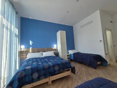 Letto o letti in una camera di Appartamento Annunziata