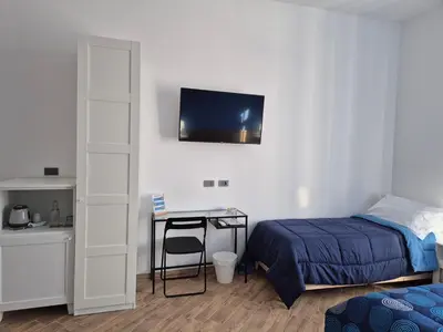 Letto o letti in una camera di Appartamento Annunziata