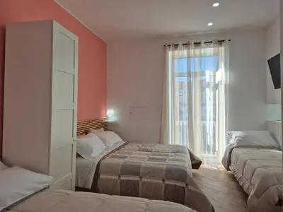 Letto o letti in una camera di Appartamento Annunziata