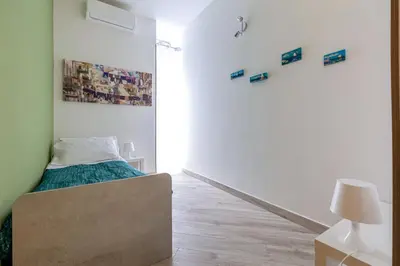 Letto o letti in una camera di La Dimora del Tritone