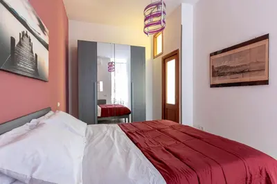 Letto o letti in una camera di La Dimora del Tritone