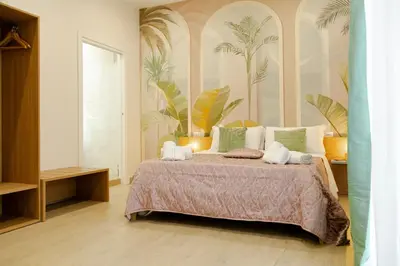 Letto o letti in una camera di A casa di Leo Rooms
