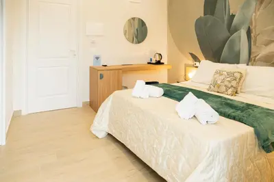 Letto o letti in una camera di A casa di Leo Rooms