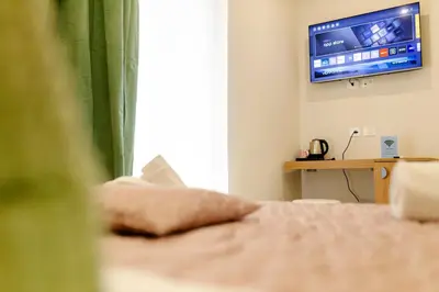 TV o dispositivi per l'intrattenimento presso A casa di Leo Rooms