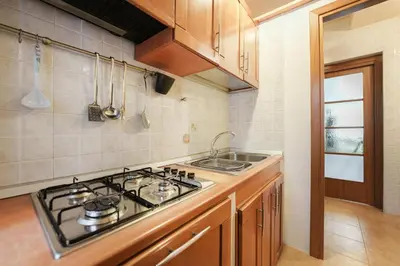 Cucina o angolo cottura di Casa Spaziosa, a pochi passi da Metro e Centro